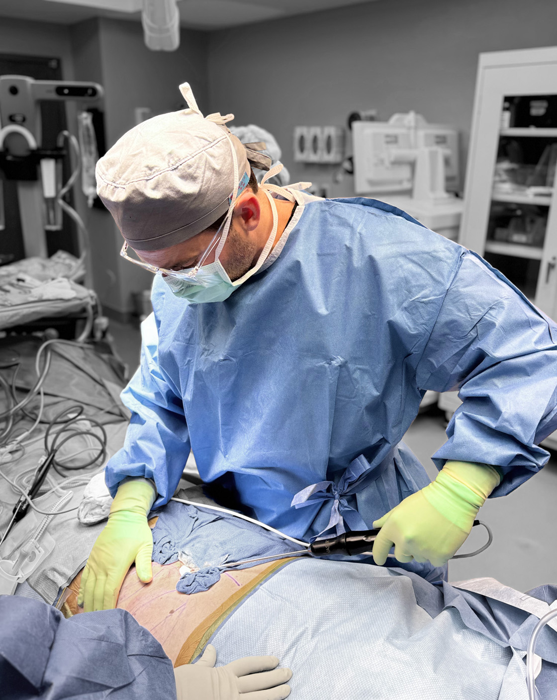 Dr. Performing surgery